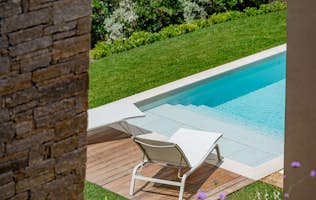 location - Thalassa Salins - Luxurious Pool and Garden  location - Thalassa Salins - Discover this beautiful outdoor pool surrounded by a well-maintained garden. Perfect for relaxation and leisure time.