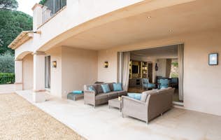 location - Pampres - Modern outdoor patio with lounge area  location - Pampres - This image shows a modern patio with a comfortable outdoor lounge area, perfect for relaxing and enjoying sunny days.