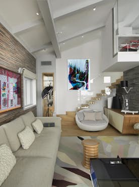 location - POW POW - Modern living room with artistic decoration  location - POW POW - A modern living room with artistic decoration, a comfortable sofa, and artworks on the walls.