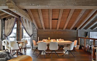 accommodation - Labaobou - Modern dining room with rustic style  accommodation - Labaobou - This modern dining room features a rustic style with wooden elements and elegant furniture. Perfect for family meals or social gatherings.