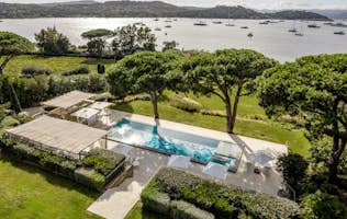 location - Canoubwest - Pool with sea view  location - Canoubwest - Beautiful outdoor pool with a stunning view of the sea and boats. Perfect for relaxation and water activities.